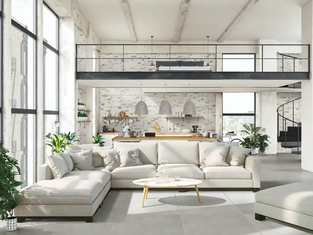 Loft with a grey porcelain floor, an example of discounted Italian tiles